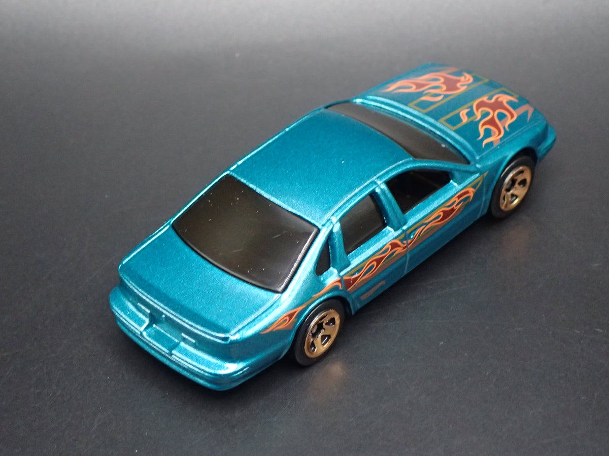1994 - 1996 CHEVY CHEVROLET IMPALA SS GREEN 1:64 SCALE DIECAST MODEL CAR