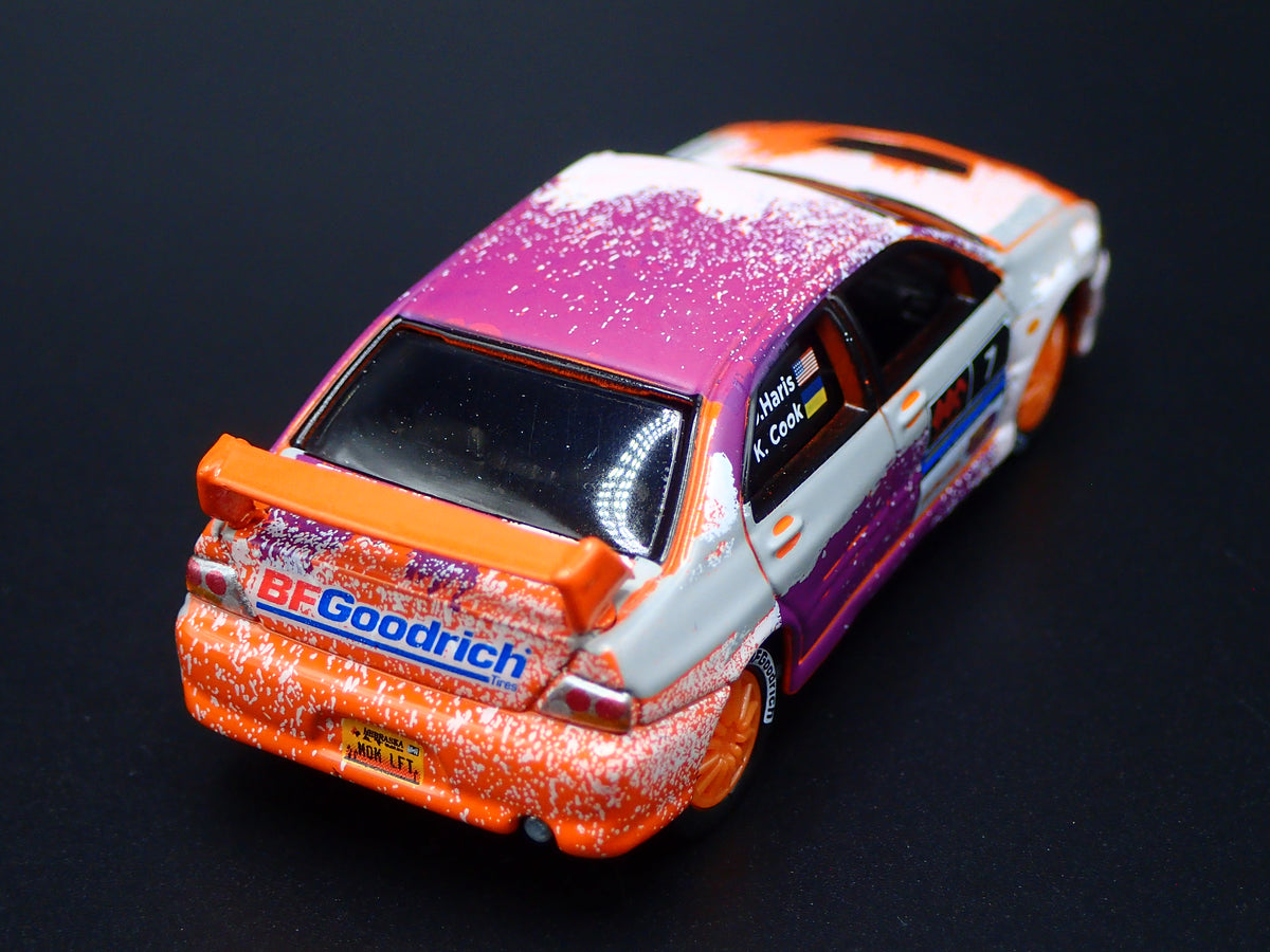 2003-2005 MITSUBISHI LANCER EVOLUTION VIII RALLY ORANGE 1:64 SCALE DIECAST MODEL CAR
