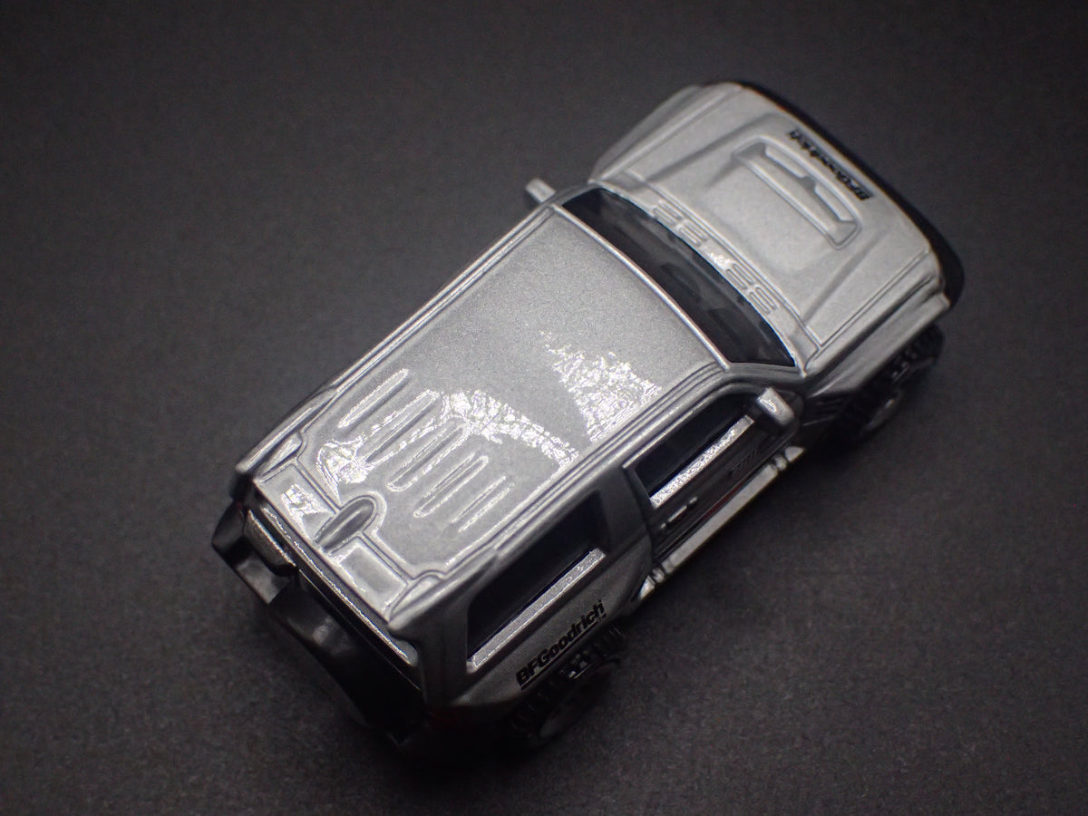 1997-1999 MITSUBISHI PAJERO EVOLUTION SUV 1:64 SCALE DIORAMA DIECAST MODEL CAR