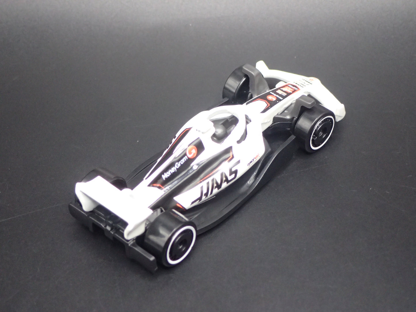 HAAS VF-25 F1 RACING 2025 1:64 SCALE COLLECTIBLE DIECAST MODEL CAR
