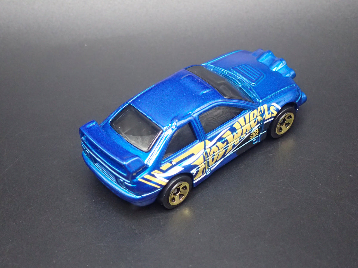 FORD ESCORT RALLY RACING BLUE 1:64 SCALE COLLECTIBLE DIECAST MODEL CAR