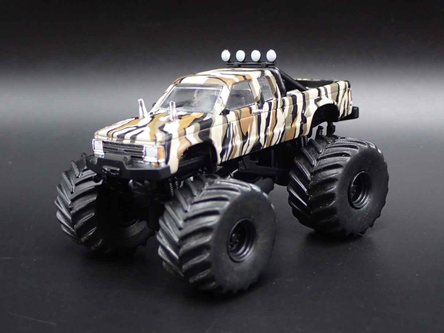 1989 CHEVROLET S10 MONSTER TRUCK ACE VENTURA NATURE 1:64 SCALE DIECAST MODEL CAR