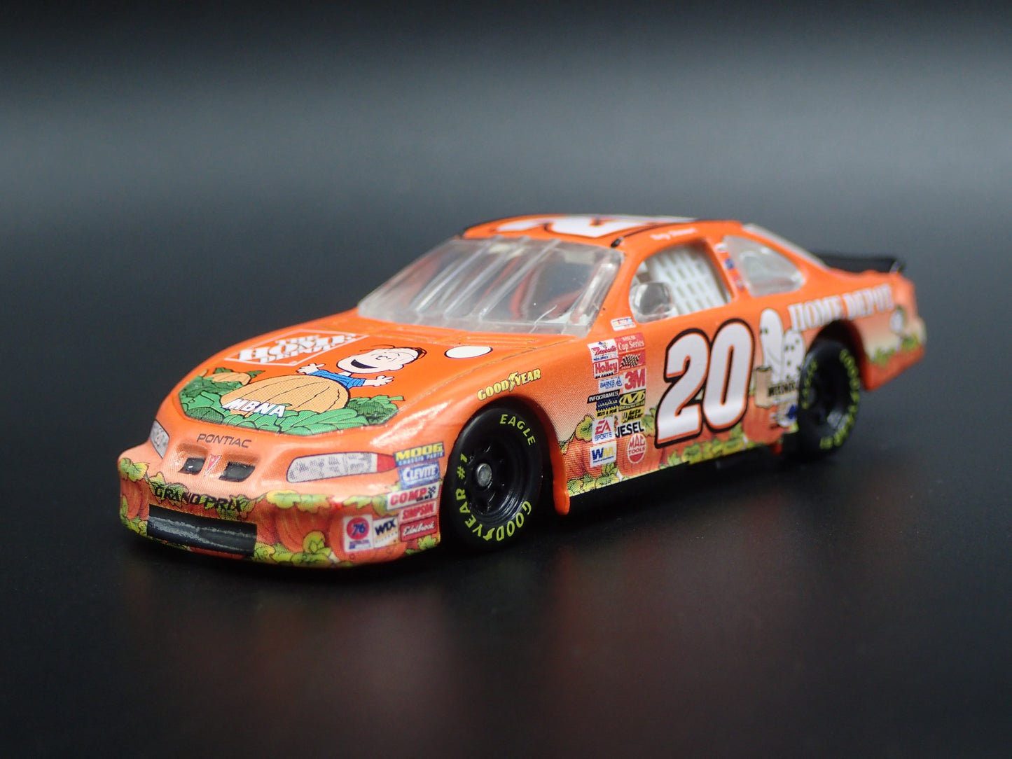 2002 PONTIAC GRAND PRIX TONY STEWART PEANUTS NASCAR 1:64 SCALE DIECAST MODEL CAR