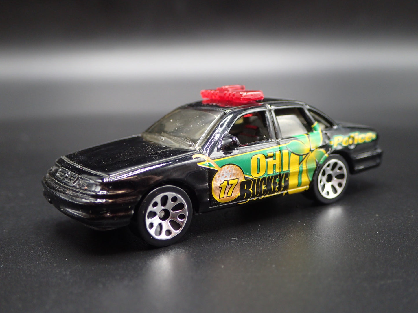 1992 - 1997 FORD CROWN VICTORIA OHIO BUCKEYES BLACK 1:64 SCALE DIECAST MODEL CAR