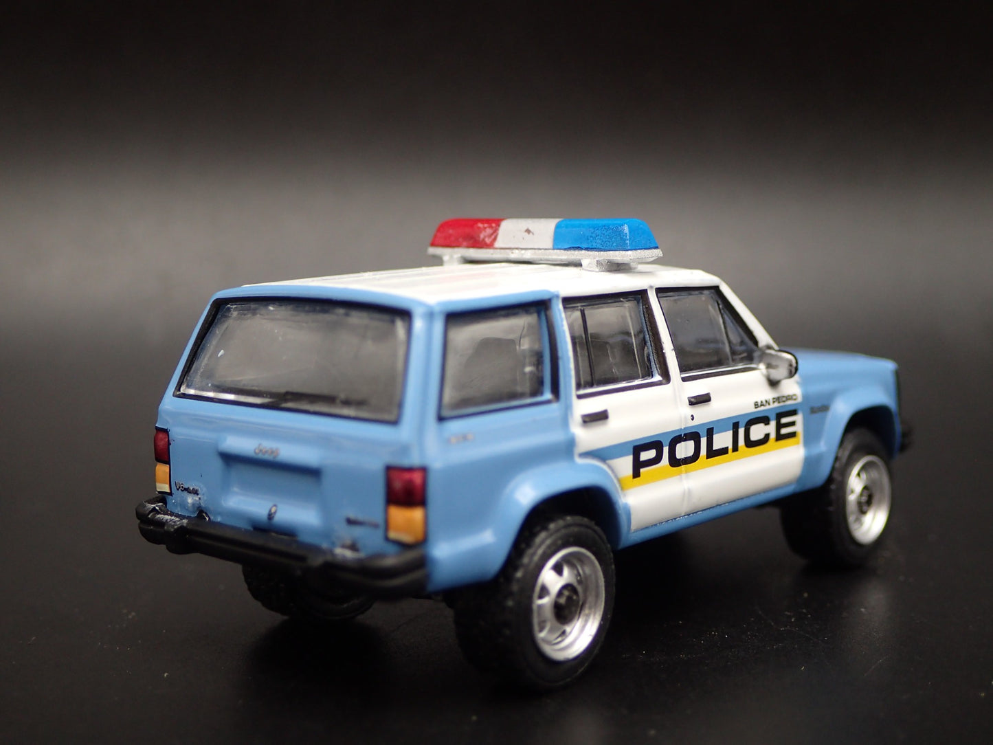 JEEP CHEROKEE XJ SPORT 4 DOOR SAN PEDRO CA POLICE 1:64 SCALE DIECAST MODEL CAR