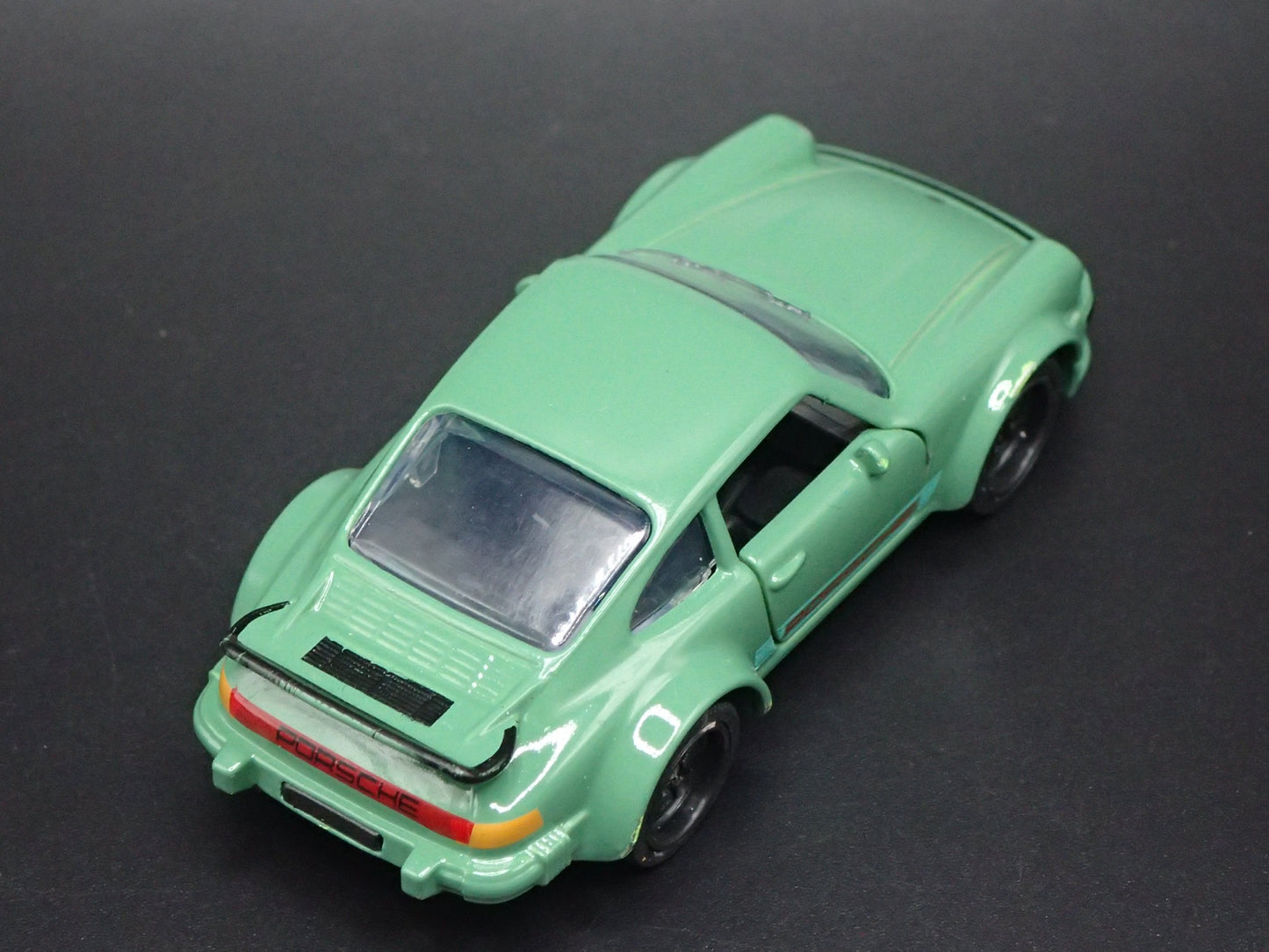 1976-1977 PORSCHE 934 GREEN 1:64 SCALE COLLECTIBLE DIORAMA DIECAST MODEL CAR