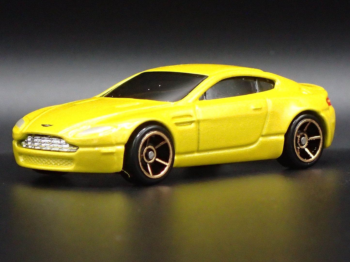 2006-2018 ASTON MARTIN V8 VANTAGE YELLOW 1/64 SCALE DIORAMA DIECAST MODEL CAR