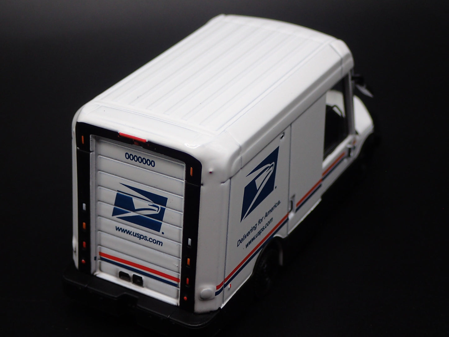 USPS UNITED STATES POSTAL SERVICE DELIVERY TRUCK NGDV 1:64 SCALE DIECAST MODEL