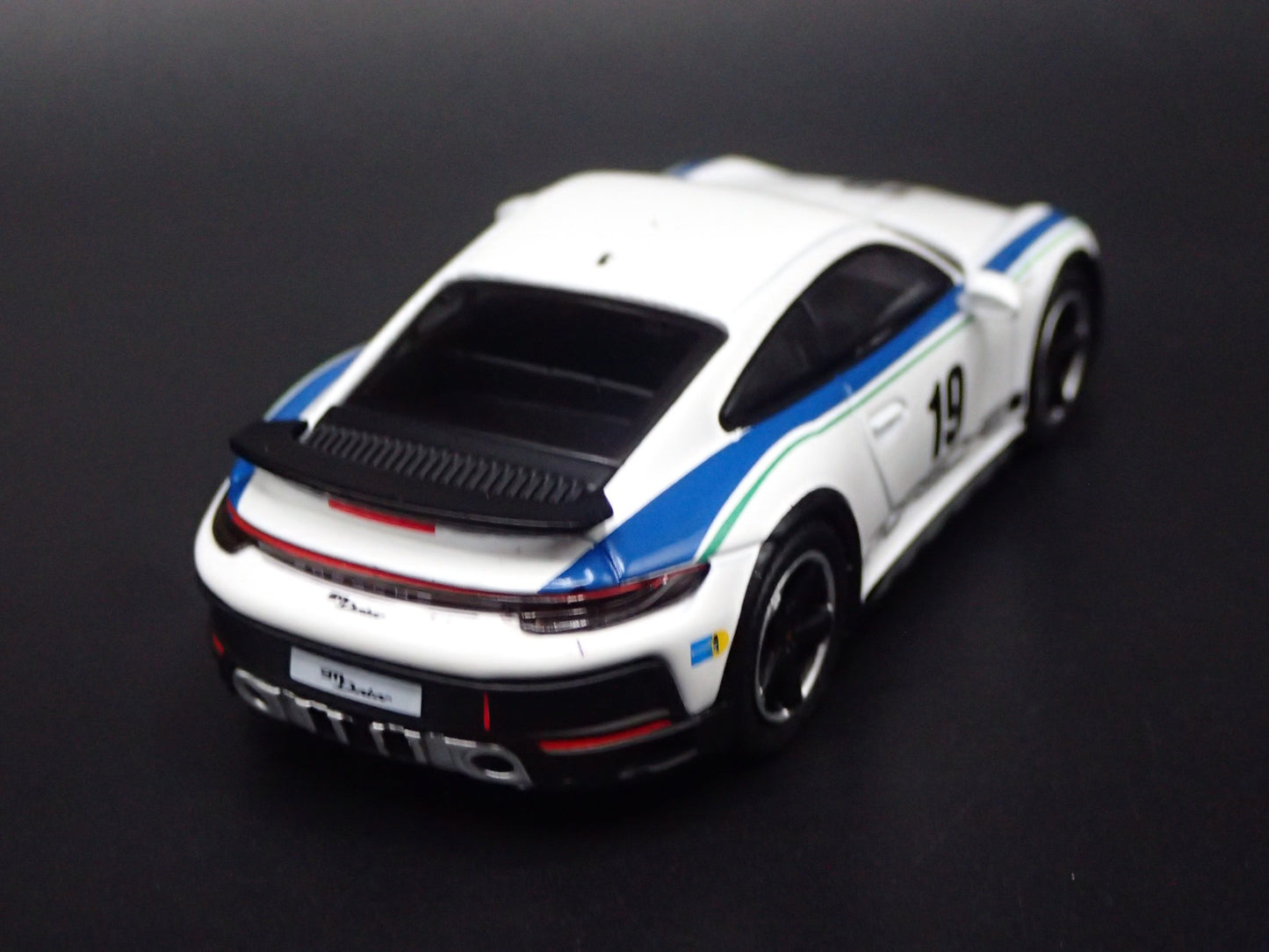 PORSCHE 911 DAKAR RALLYE OFF ROAD WHITE 1/64 SCALE COLLECTIBLE DIECAST MODEL CAR
