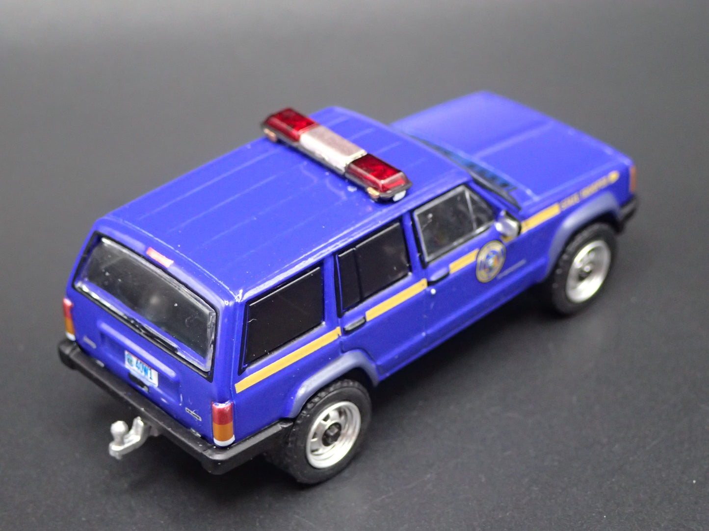 JEEP CHEROKEE XJ SPORT 4 DOOR NEW YORK STATE TROOPER 1:64 DIECAST MODEL CAR