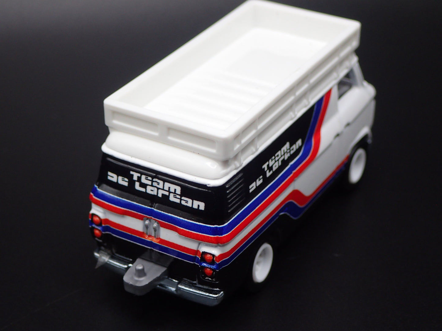 1965-1977 FORD TRANSIT SUPER VAN DELOREAN RACING 1:64 SCALE DIECAST MODEL CAR