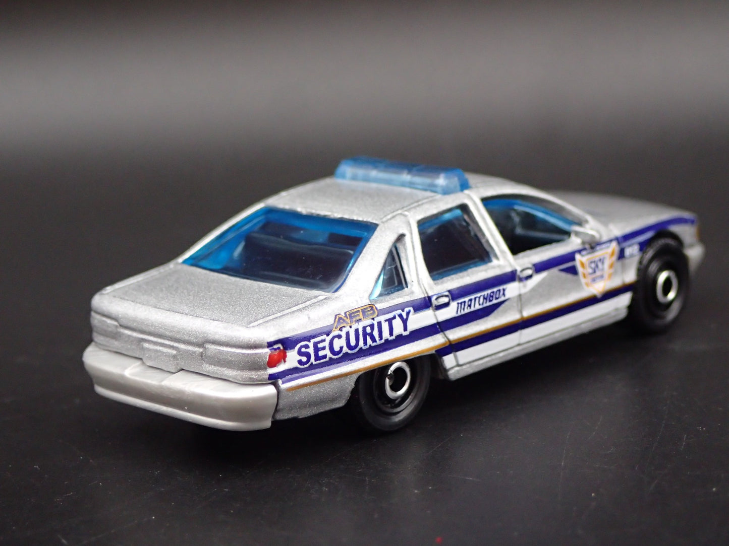 1991-1996 CHEVY CHEVROLET CAPRICE POLICE SECURITY 1/64 SCALE DIECAST MODEL CAR