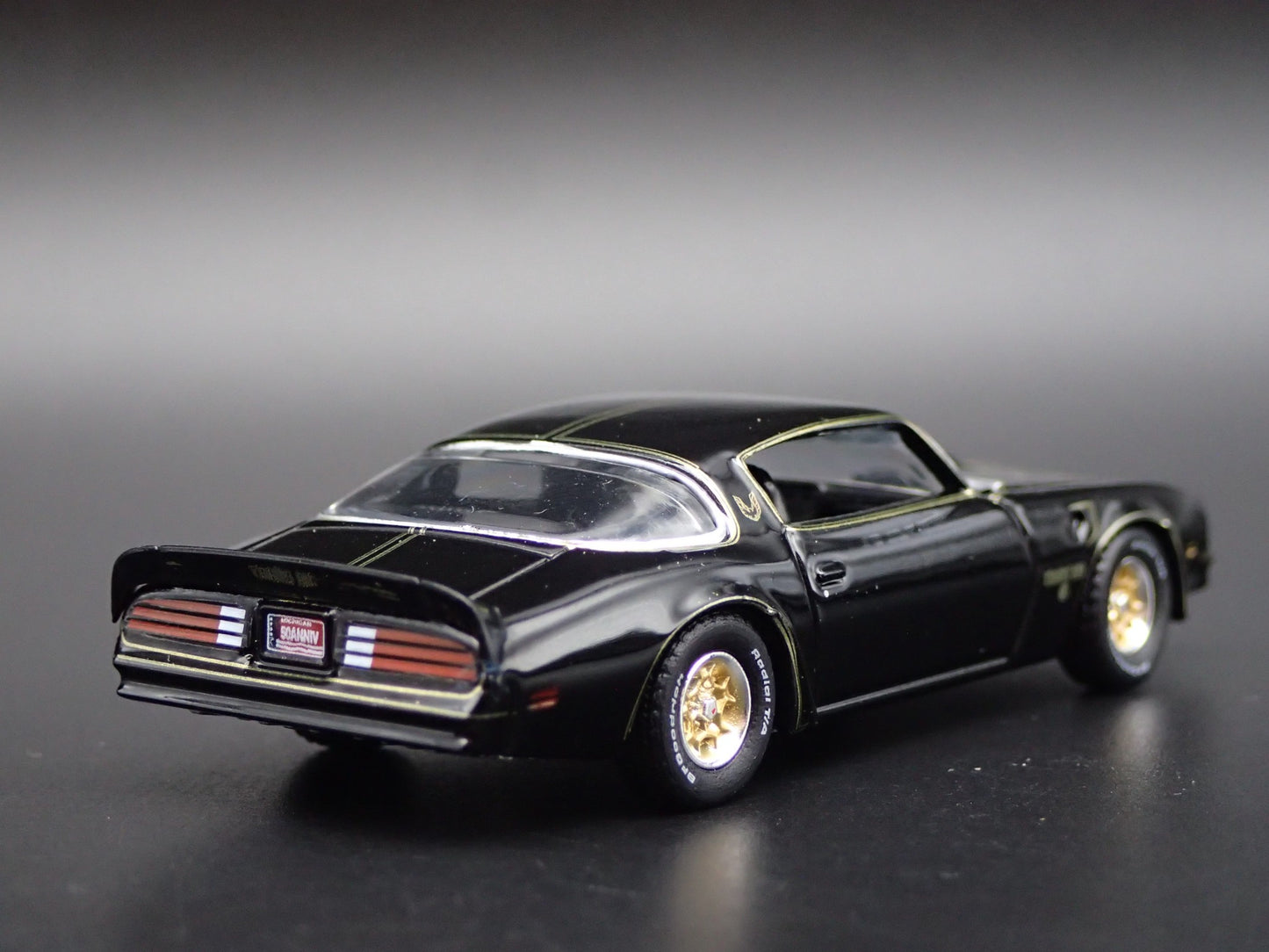 1976 76 PONTIAC FIREBIRD T/A 50TH ANNIVERSARY BLACK 1:64 SCALE DIECAST MODEL CAR