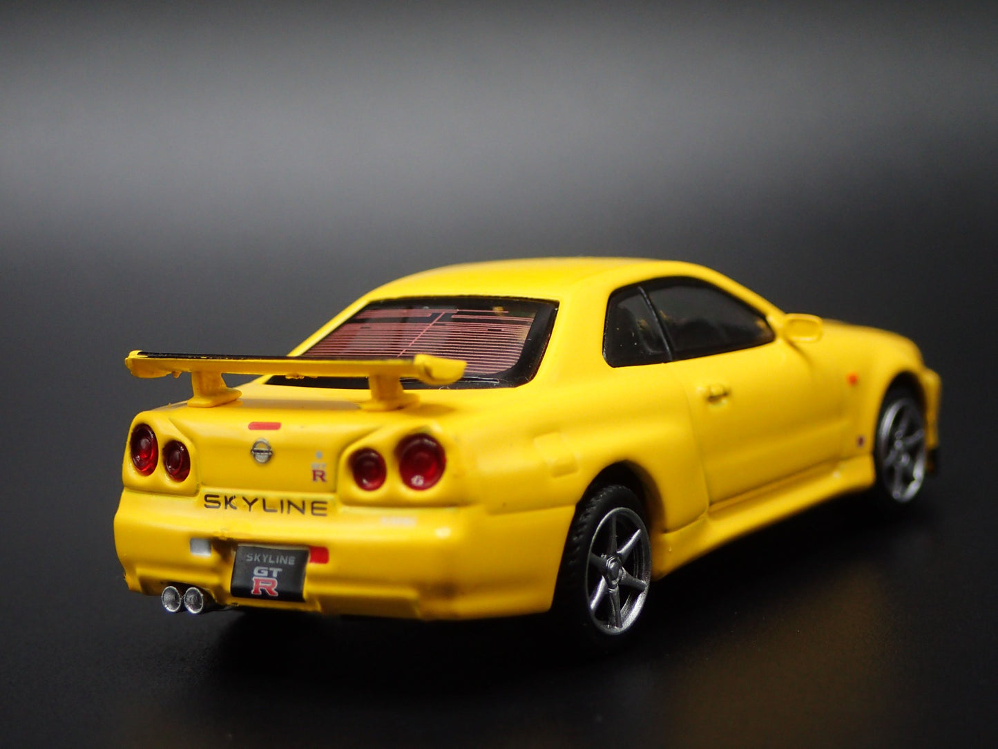 1999-2002 NISSAN SKYLINE GTR R34 VSPEC YELLOW 1:64 SCALE DIECAST MODEL CAR