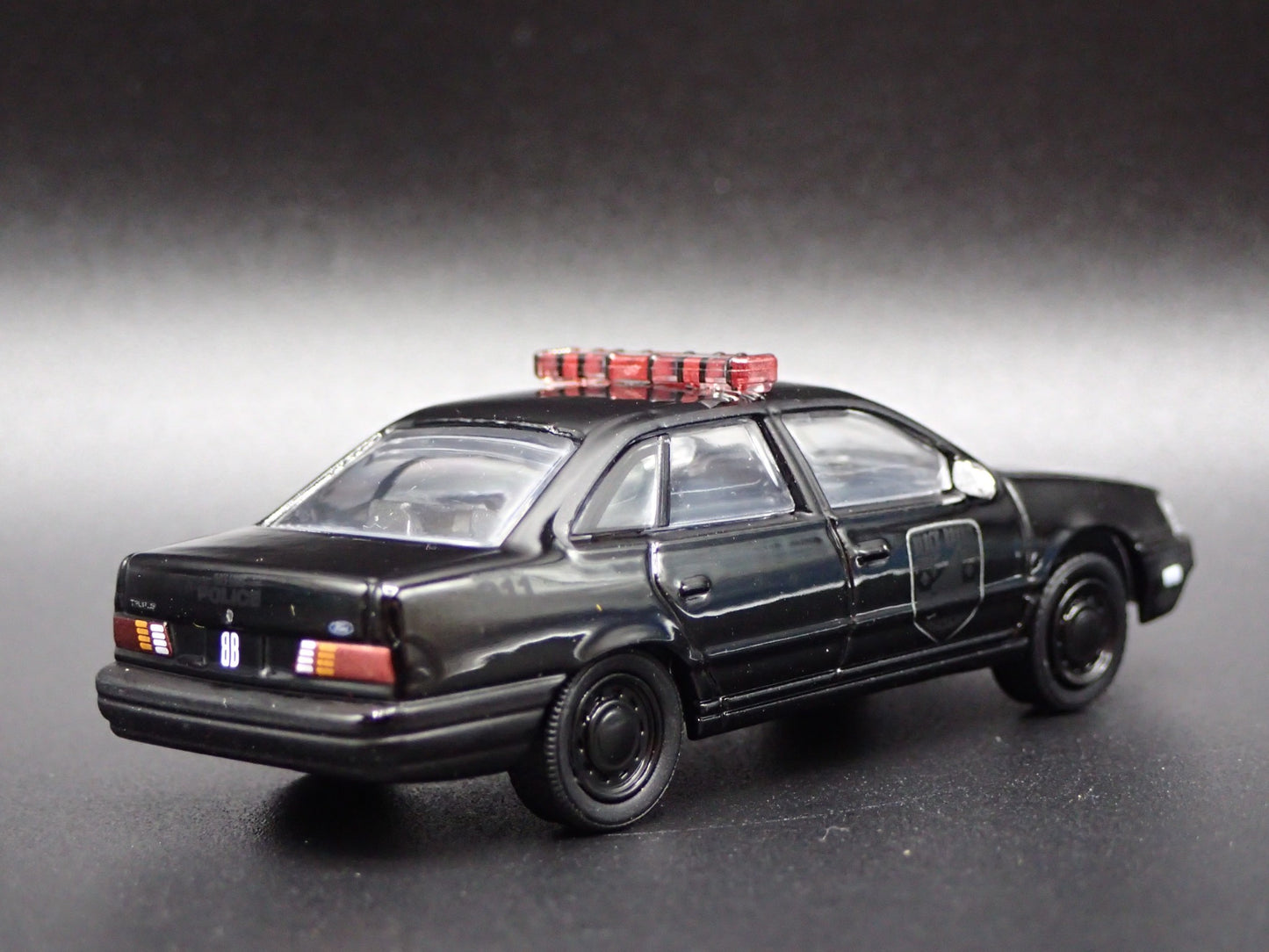 1986-1991 FORD TAURUS POLICE CAR 4 FOUR DOOR BLACK 1:64 SCALE DIECAST MODEL CAR