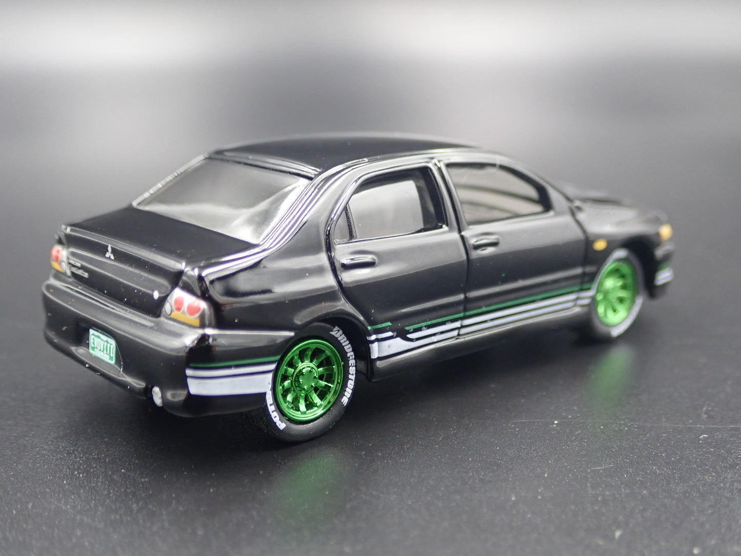 1999-2007 MITSUBISHI LANCER EVOLUTION EVO IV BLACK 1:64 SCALE DIECAST MODEL CAR