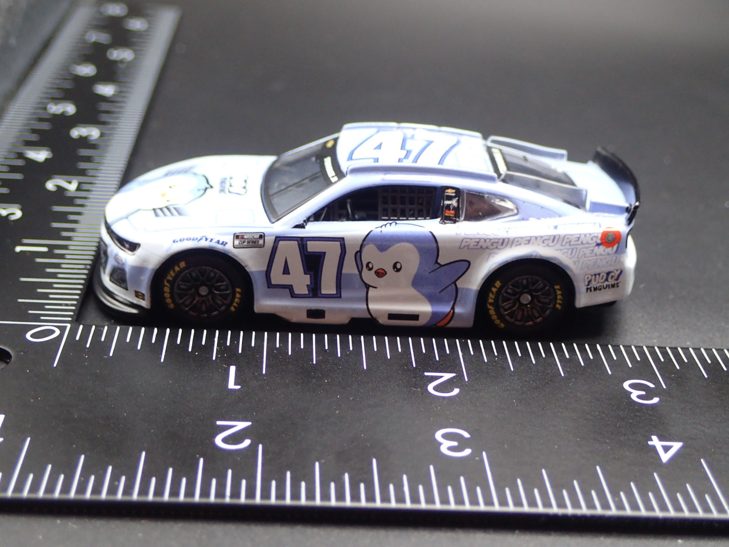 2025 25 CHEVROLET 47 RICKY STENHOUSE JR PENGUINS SALUTES NASCAR 1:64 DIECAST CAR