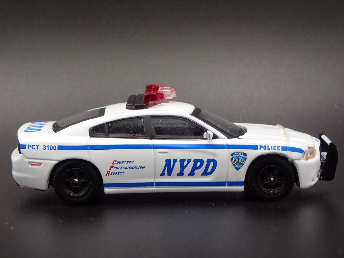 2012 12 DODGE CHARGER NYPD POLICE CAR RARE 1/64 SCALE DIORAMA DIECAST MODEL CAR-Burning Rubber Toy Company