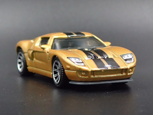 2005-2006 FORD GT GOLD 1:64 SCALE LIMITED COLLECTIBLE DIORAMA DIECAST MODEL CAR