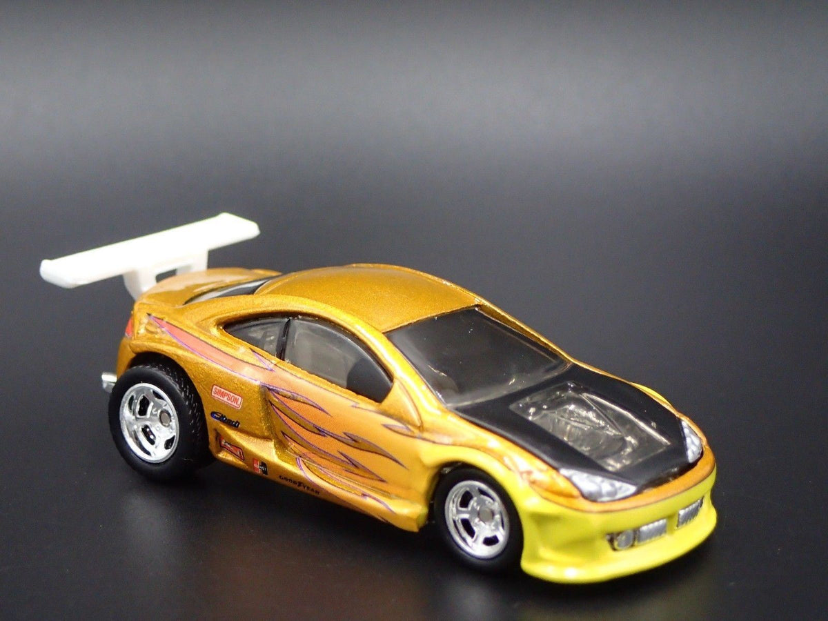 1999-2002 MERC MERCURY COUGAR 1/64 SCALE COLLECTIBLE DIORAMA DIECAST MODEL CAR-Burning Rubber Toy Company