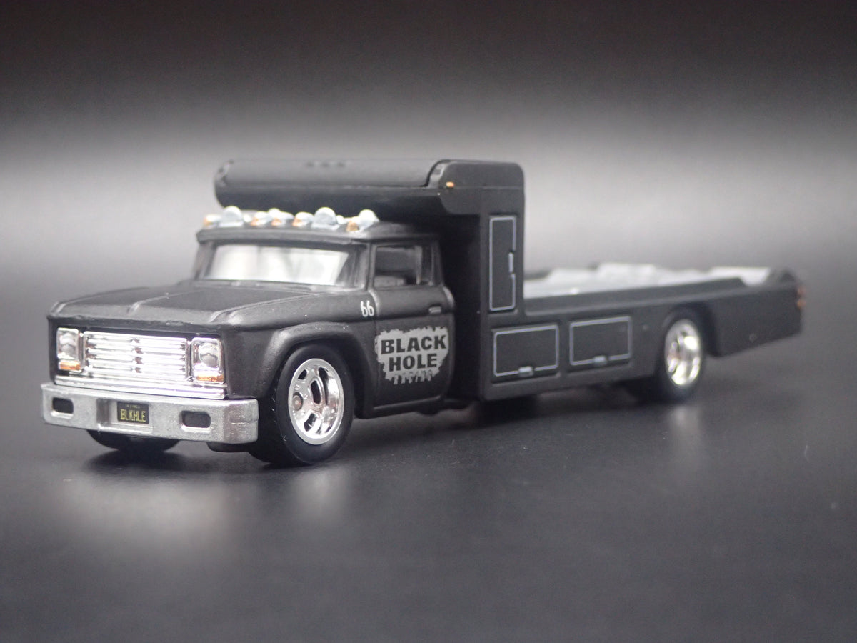 VINTAGE RACING FLATBED CAR HAULER TRUCK BLACK 1/64 SCALE DIECAST MODEL CAR