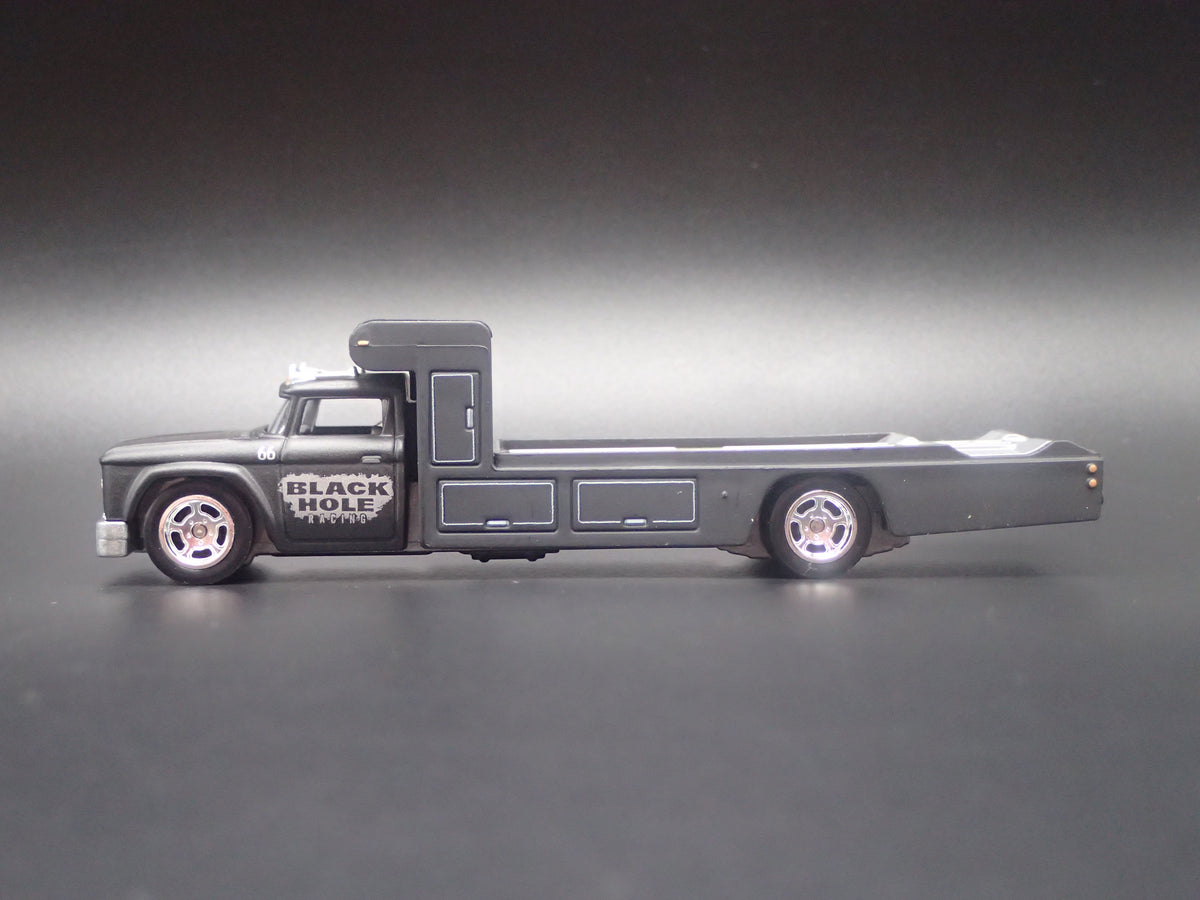 VINTAGE RACING FLATBED CAR HAULER TRUCK BLACK 1/64 SCALE DIECAST MODEL CAR