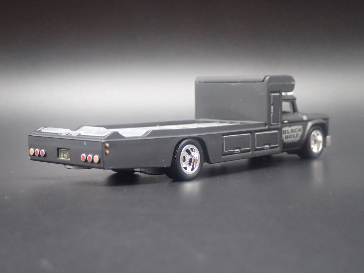 VINTAGE RACING FLATBED CAR HAULER TRUCK BLACK 1/64 SCALE DIECAST MODEL CAR