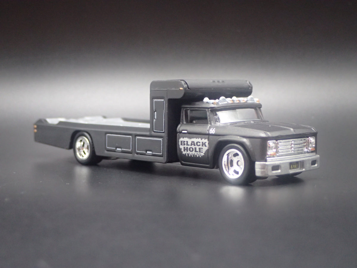VINTAGE RACING FLATBED CAR HAULER TRUCK BLACK 1/64 SCALE DIECAST MODEL CAR