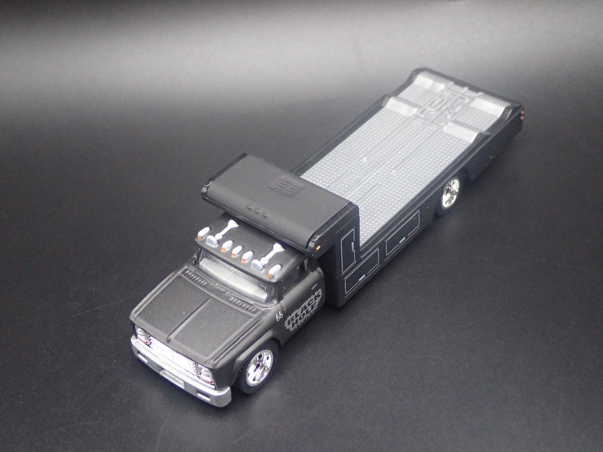 VINTAGE RACING FLATBED CAR HAULER TRUCK BLACK 1/64 SCALE DIECAST MODEL CAR