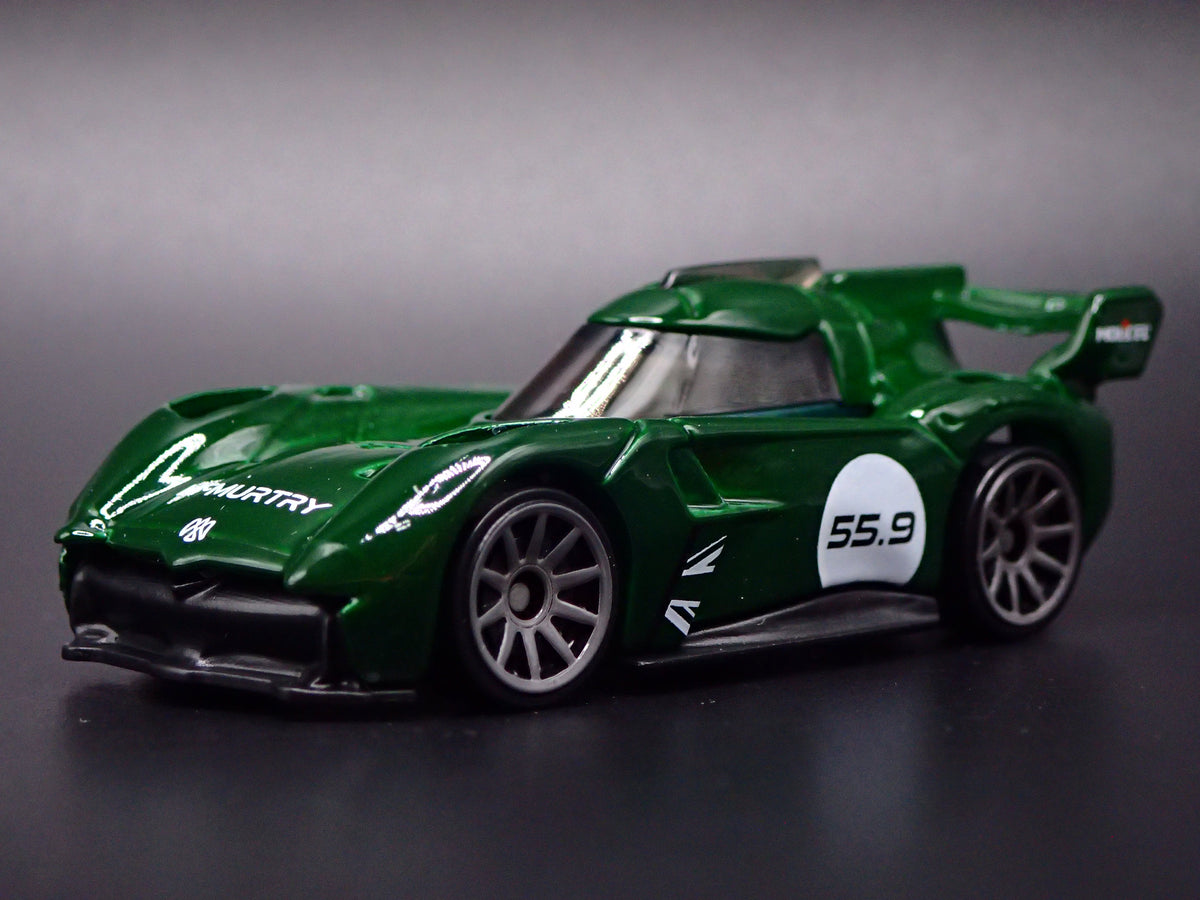 MCMURTRY SPEIRLING ELECTRIC CAR GREEN 1:64 SCALE DIORAMA DIECAST MODEL CAR