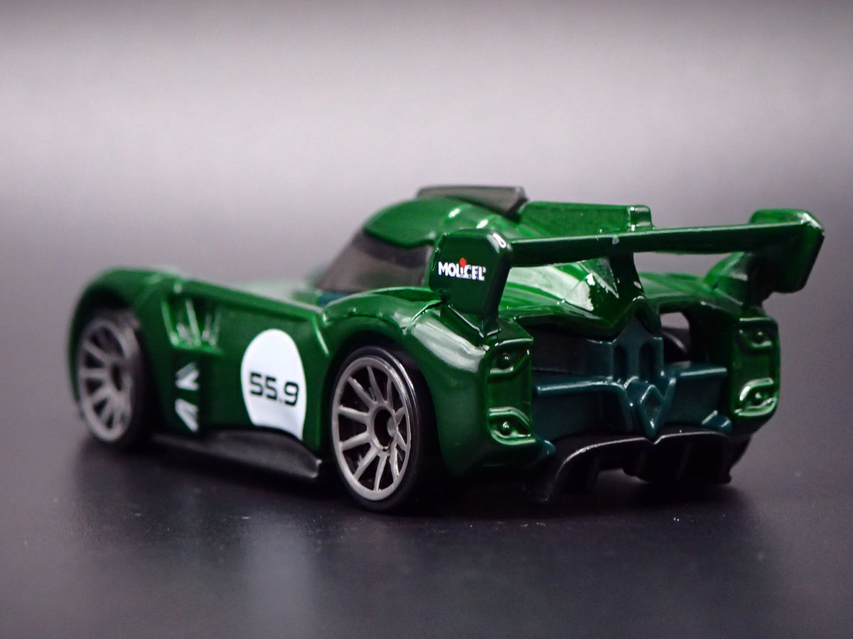 MCMURTRY SPEIRLING ELECTRIC CAR GREEN 1:64 SCALE DIORAMA DIECAST MODEL CAR