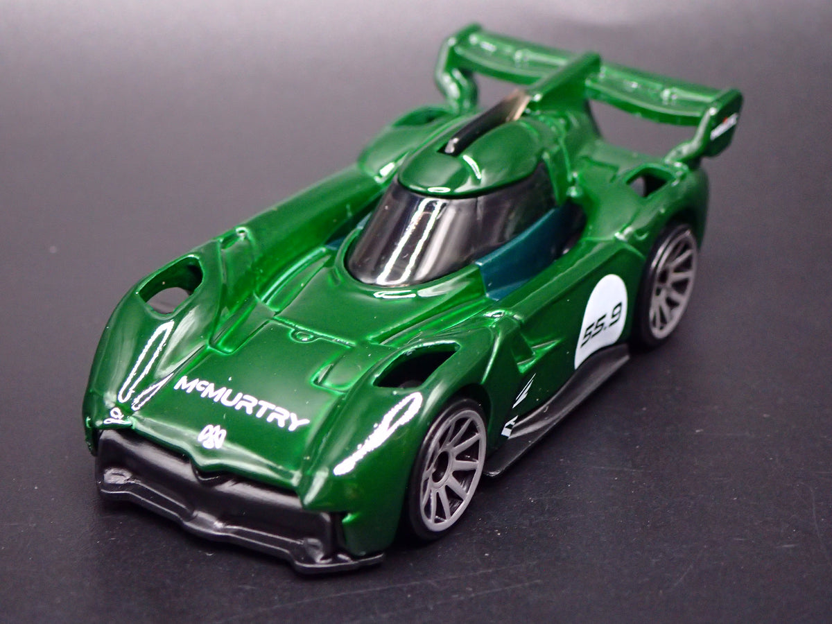 MCMURTRY SPEIRLING ELECTRIC CAR GREEN 1:64 SCALE DIORAMA DIECAST MODEL CAR