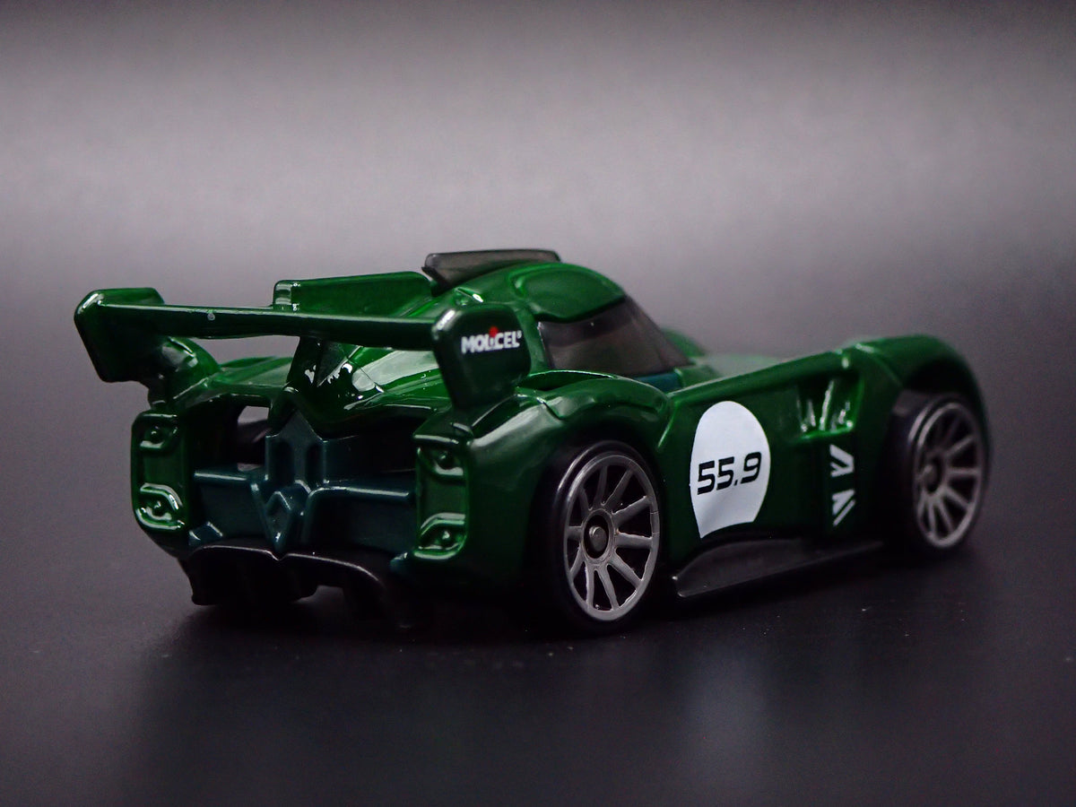 MCMURTRY SPEIRLING ELECTRIC CAR GREEN 1:64 SCALE DIORAMA DIECAST MODEL CAR