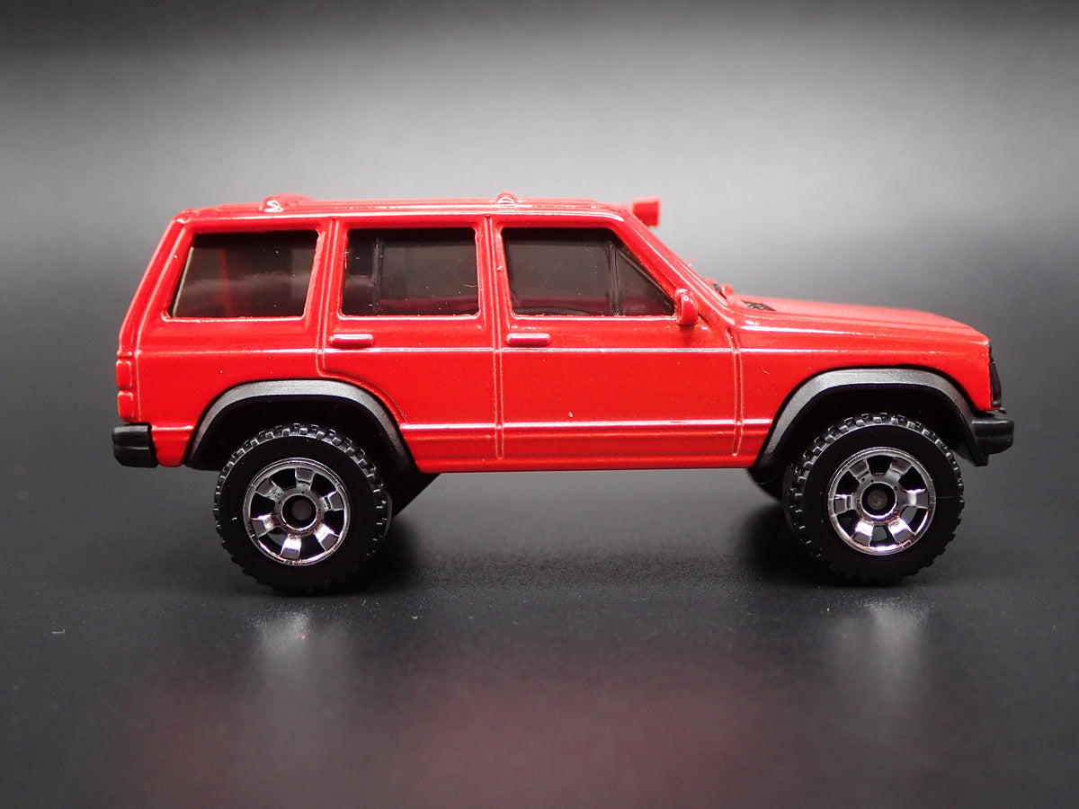 1984-2001 JEEP CHEROKEE XJ SPORT 4 DOOR RED 1:64 SCALE DIECAST MODEL CAR