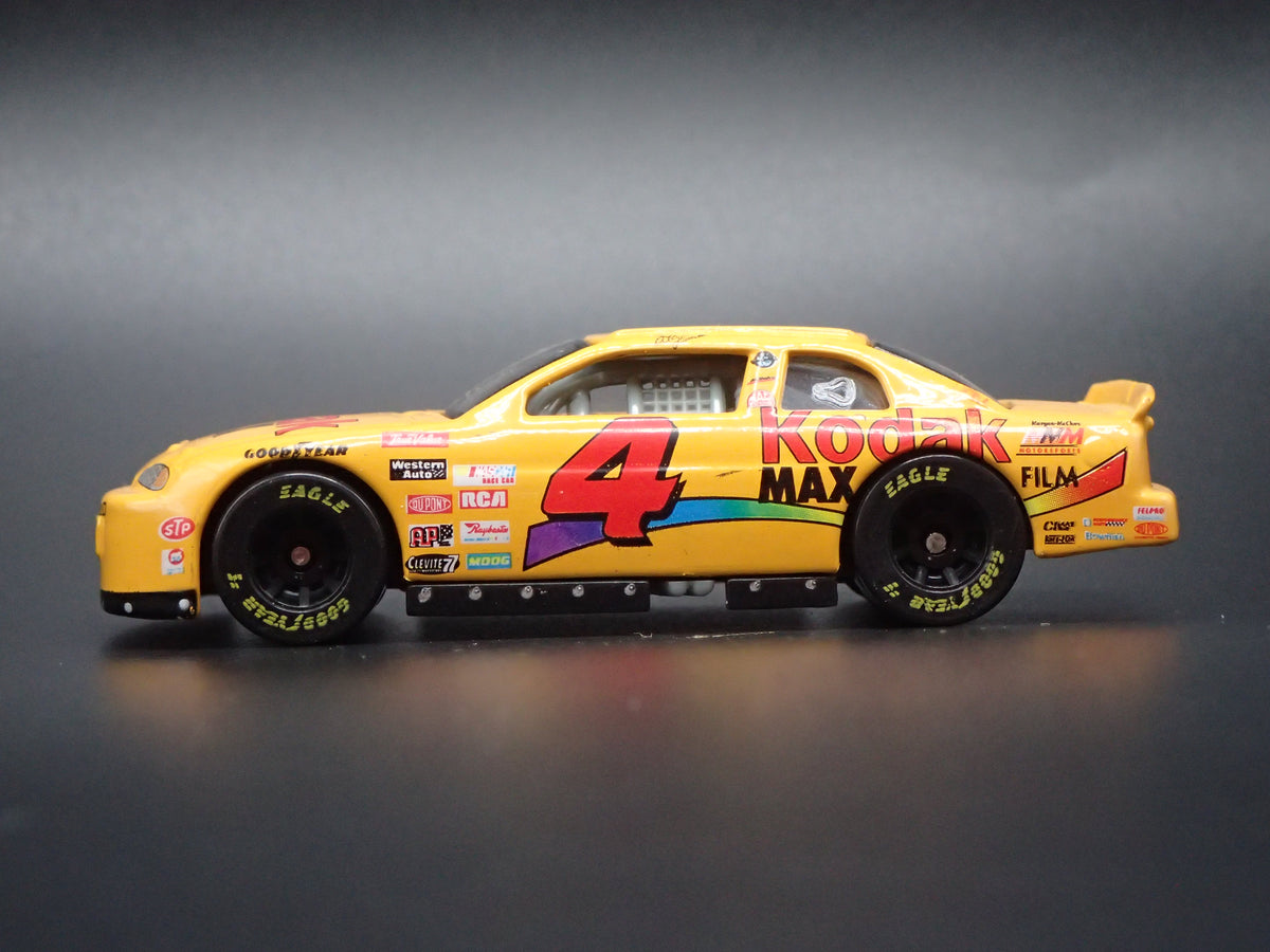1999 CHEVY CHEVROLET MONTE CARLO 4 STERLING MARLIN NASCAR 1:64 SCALE DIECAST MODEL CAR