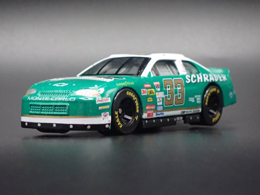 1998 CHEVY CHEVROLET MONTE CARLO 33 KEN SCHRADER NASCAR 1:64 SCALE DIECAST CAR-Burning Rubber Toy Company