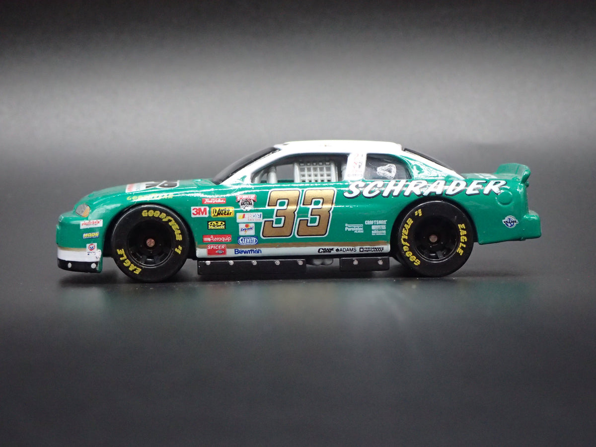 1998 CHEVY CHEVROLET MONTE CARLO 33 KEN SCHRADER NASCAR 1:64 SCALE DIECAST CAR