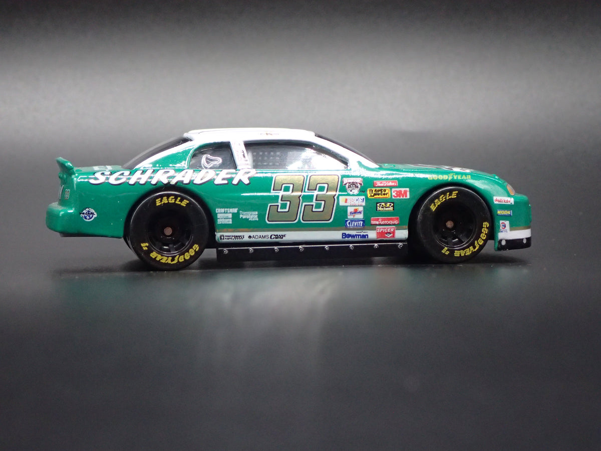 1998 CHEVY CHEVROLET MONTE CARLO 33 KEN SCHRADER NASCAR 1:64 SCALE DIECAST CAR