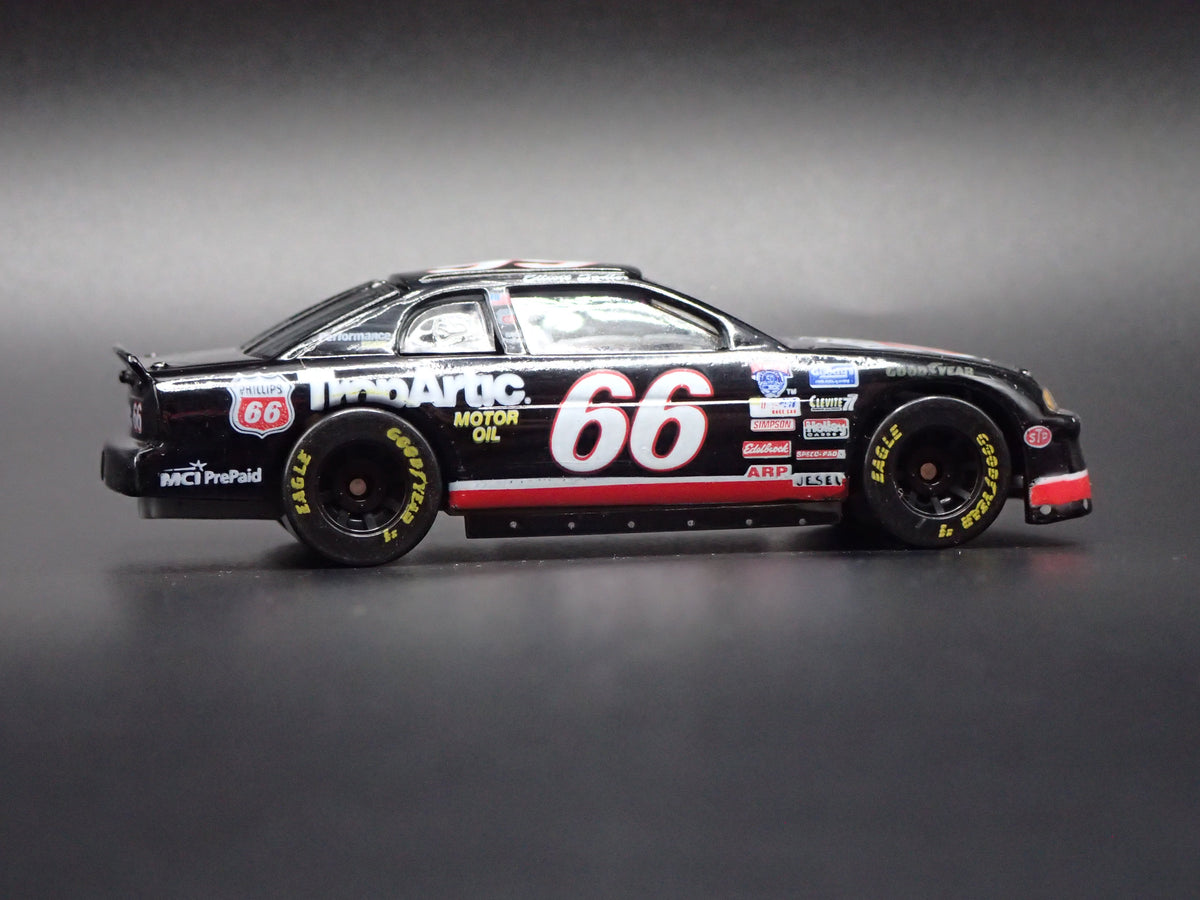 1998 98 CHEVY MONTE CARLO 66 ELLIOT SADLER NASCAR 1:64 SCALE DIECAST MODEL CAR