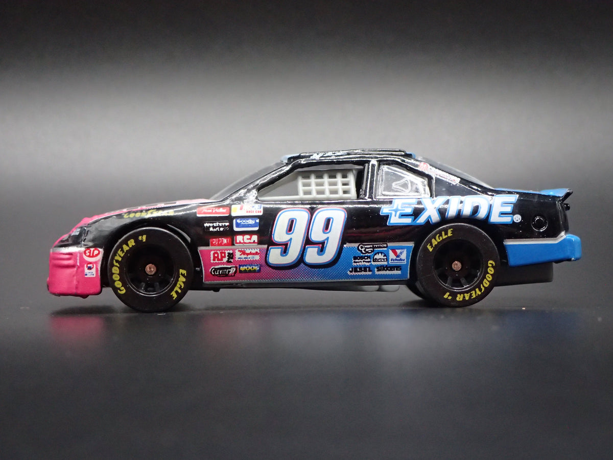 1996 FORD THUNDERBIRD 99 JEFF BURTON EXIDE NASCAR 1:64 SCALE DIECAST MODEL CAR
