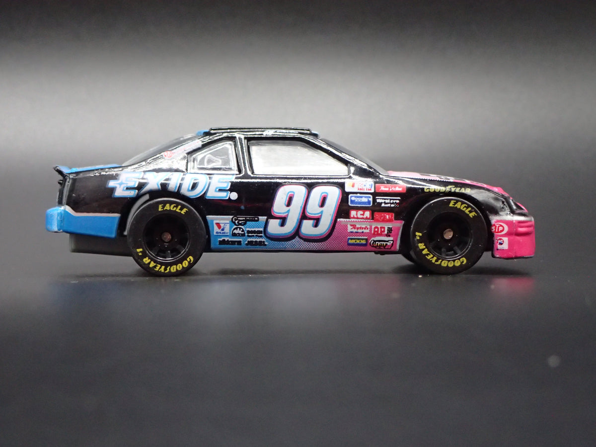 1996 FORD THUNDERBIRD 99 JEFF BURTON EXIDE NASCAR 1:64 SCALE DIECAST MODEL CAR