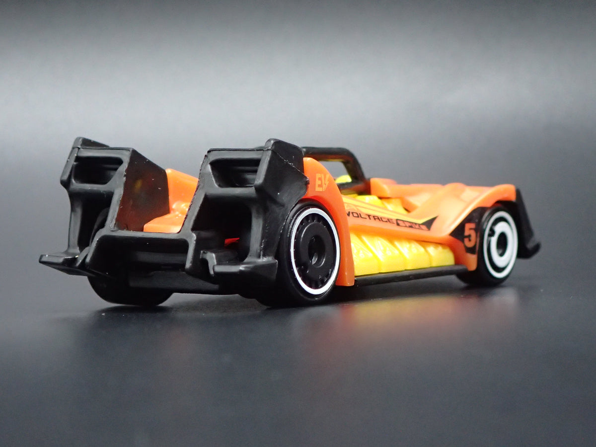 VOLTAGE SPIKE RACE CAR ORANGE 1:64 SCALE COLLECTIBLE DIORAMA DIECAST MODEL CAR