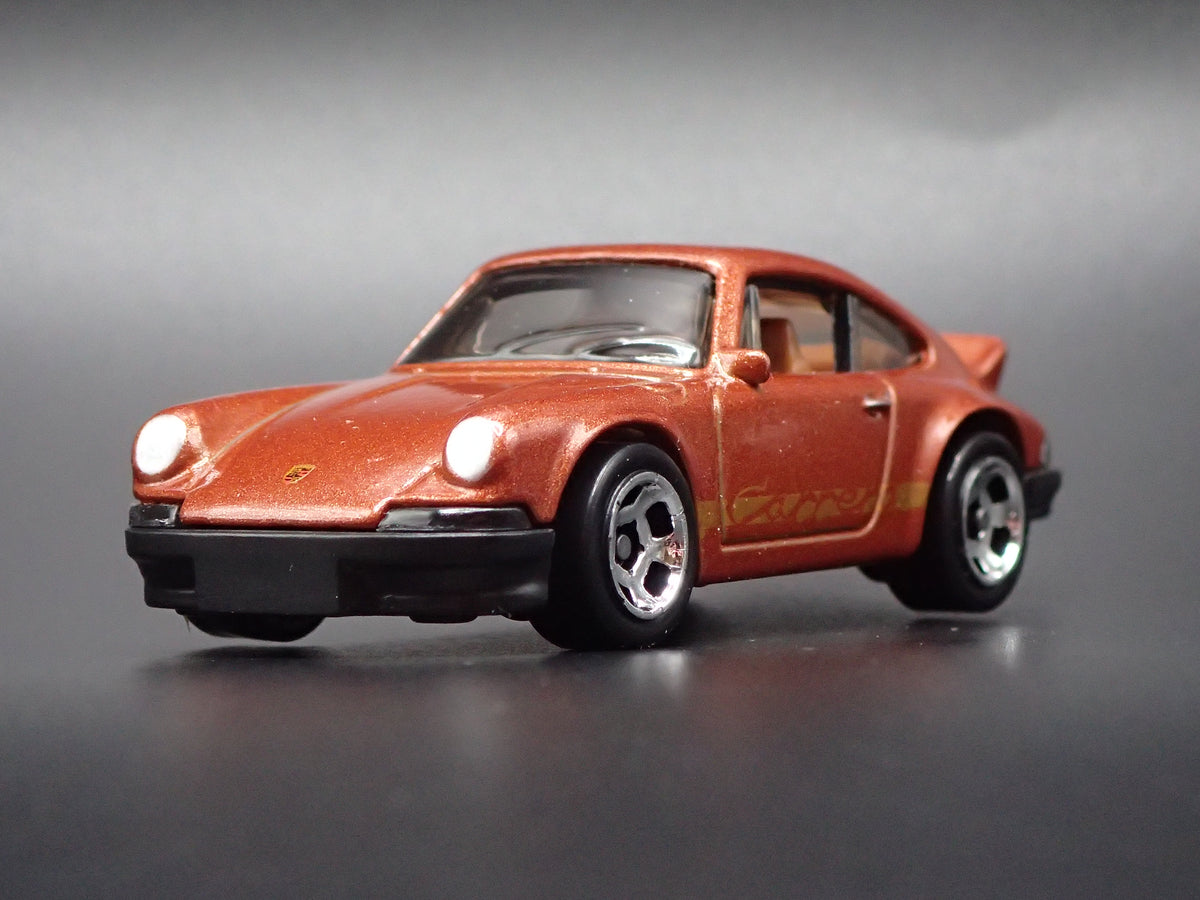 1973-1977 PORSCHE 911 CARRERA RS 2.7 1:64 SCALE COLLECTIBLE DIECAST MODEL CAR