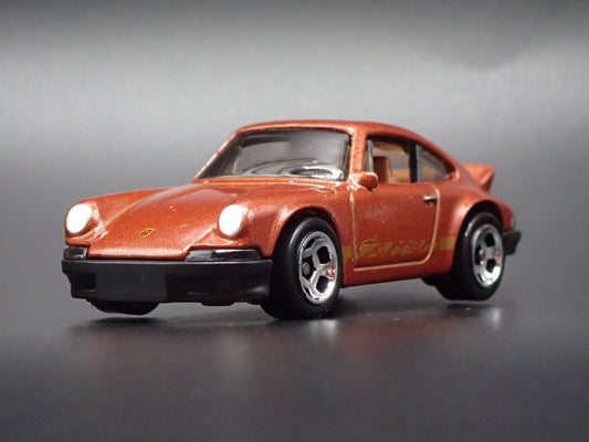 1973-1977 PORSCHE 911 CARRERA RS 2.7 1:64 SCALE COLLECTIBLE DIECAST MODEL CAR
