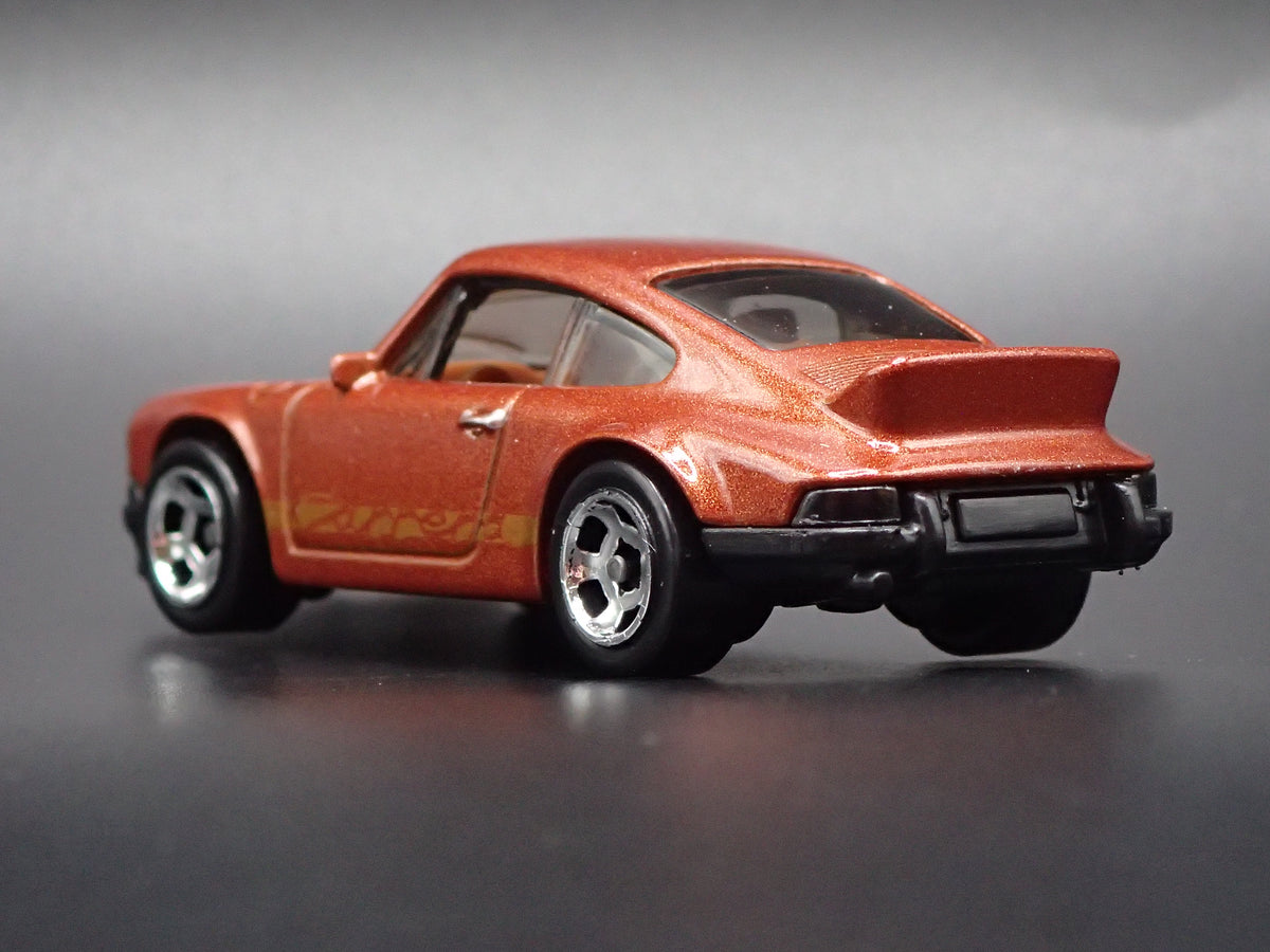 1973-1977 PORSCHE 911 CARRERA RS 2.7 1:64 SCALE COLLECTIBLE DIECAST MODEL CAR