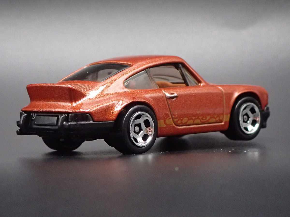 1973-1977 PORSCHE 911 CARRERA RS 2.7 1:64 SCALE COLLECTIBLE DIECAST MODEL CAR