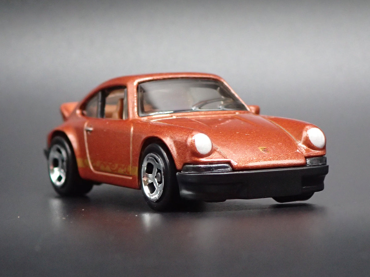 1973-1977 PORSCHE 911 CARRERA RS 2.7 1:64 SCALE COLLECTIBLE DIECAST MODEL CAR