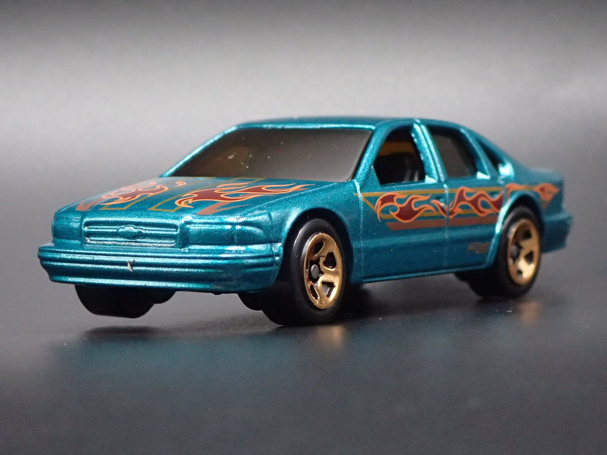 1994 - 1996 CHEVY CHEVROLET IMPALA SS GREEN 1:64 SCALE DIECAST MODEL CAR