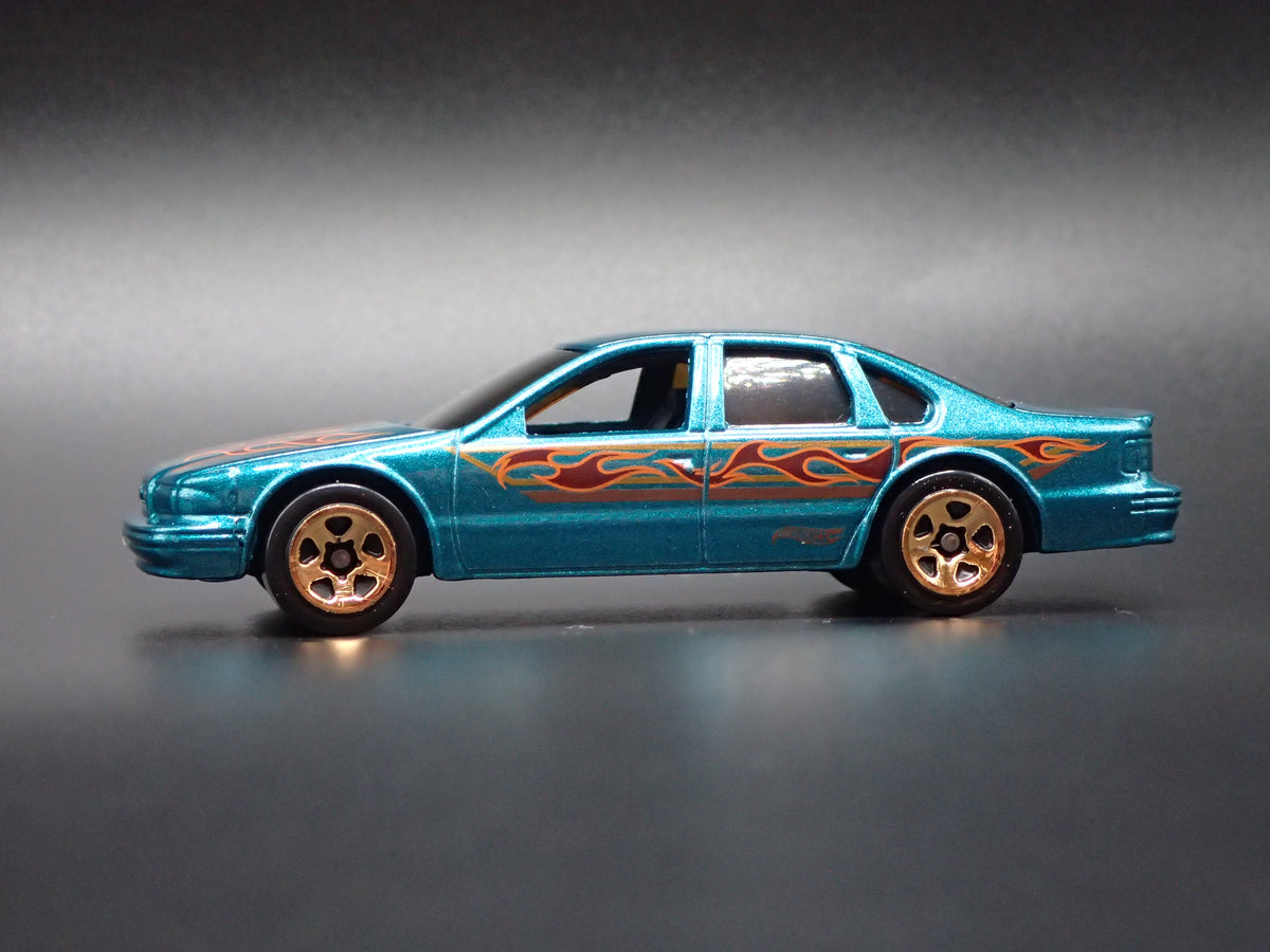 1994 - 1996 CHEVY CHEVROLET IMPALA SS GREEN 1:64 SCALE DIECAST MODEL CAR