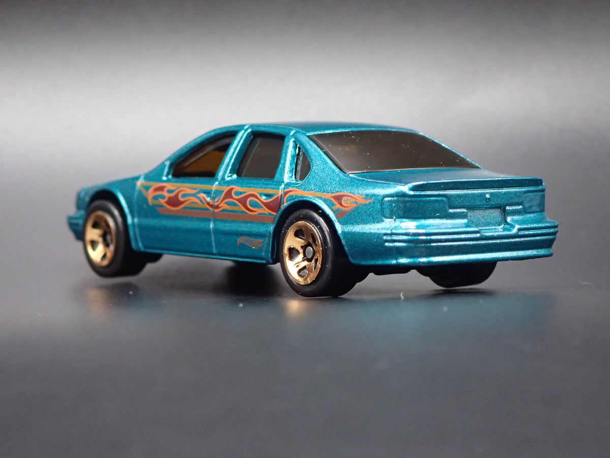 1994 - 1996 CHEVY CHEVROLET IMPALA SS GREEN 1:64 SCALE DIECAST MODEL CAR